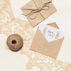 Brown Paper Envelopes On Embroidery Fabric Psd