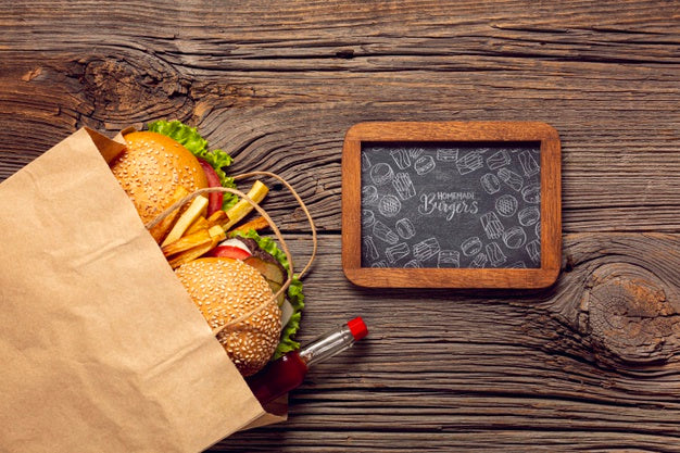 Burger Menu In Paper Bag On Wooden Background And Frame Wooden Background Psd