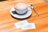 Business Cards and Coffee Cup on Table (Mockup)