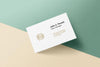 Business Card Laying On A Wall Mockup Psd
