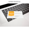 Business Card Mock-Up On Laptop Psd