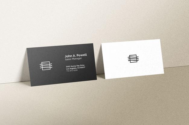 Business Cards Laying On A Wall Mockup Psd