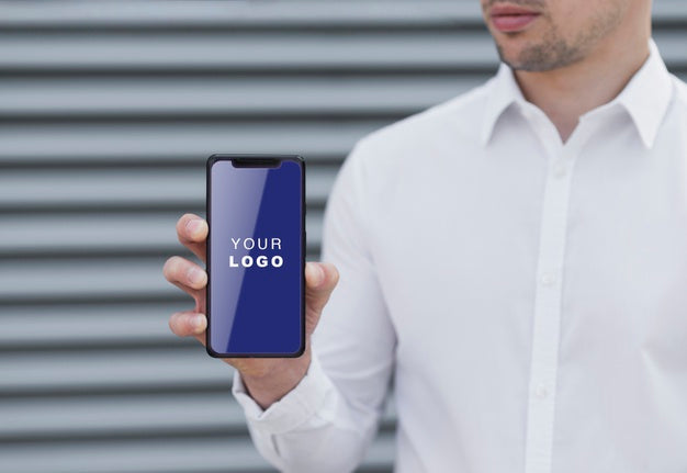 Business Man Holding Smartphone Mock-Up Psd