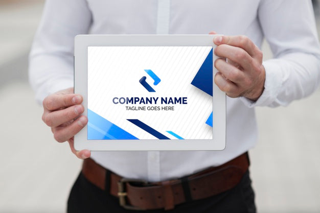 Business Man Holding Tablet Mock-Up Psd