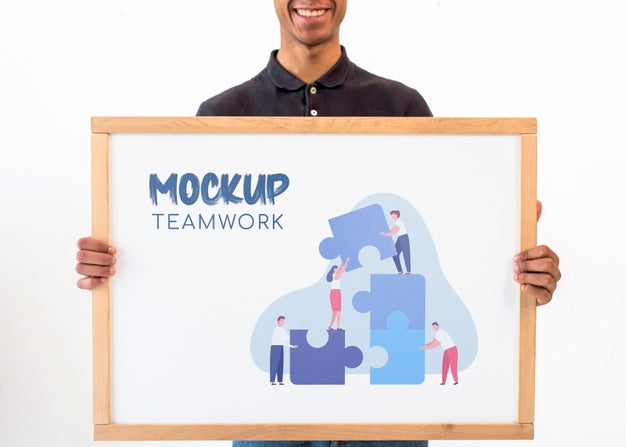 Business Man Holding Teamwork Mock-Up Psd