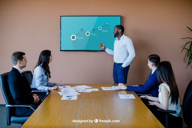 Business Meeting With Tv Mockup Psd