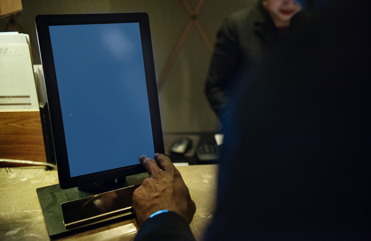 Business People Discusing About Work Using Tablet