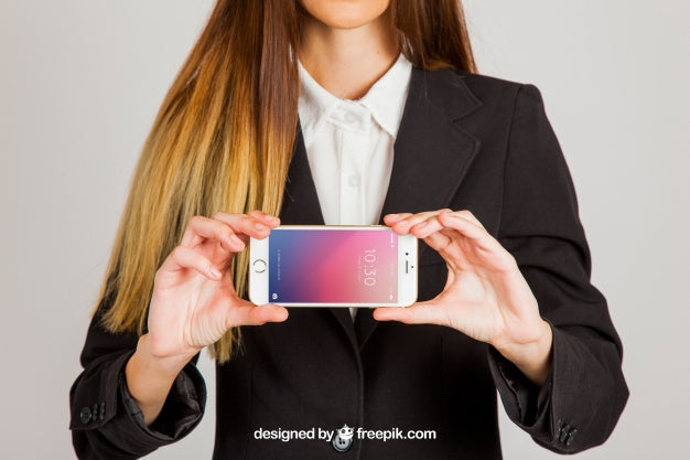 Business Woman Holding Smartphone With Two Hands Psd