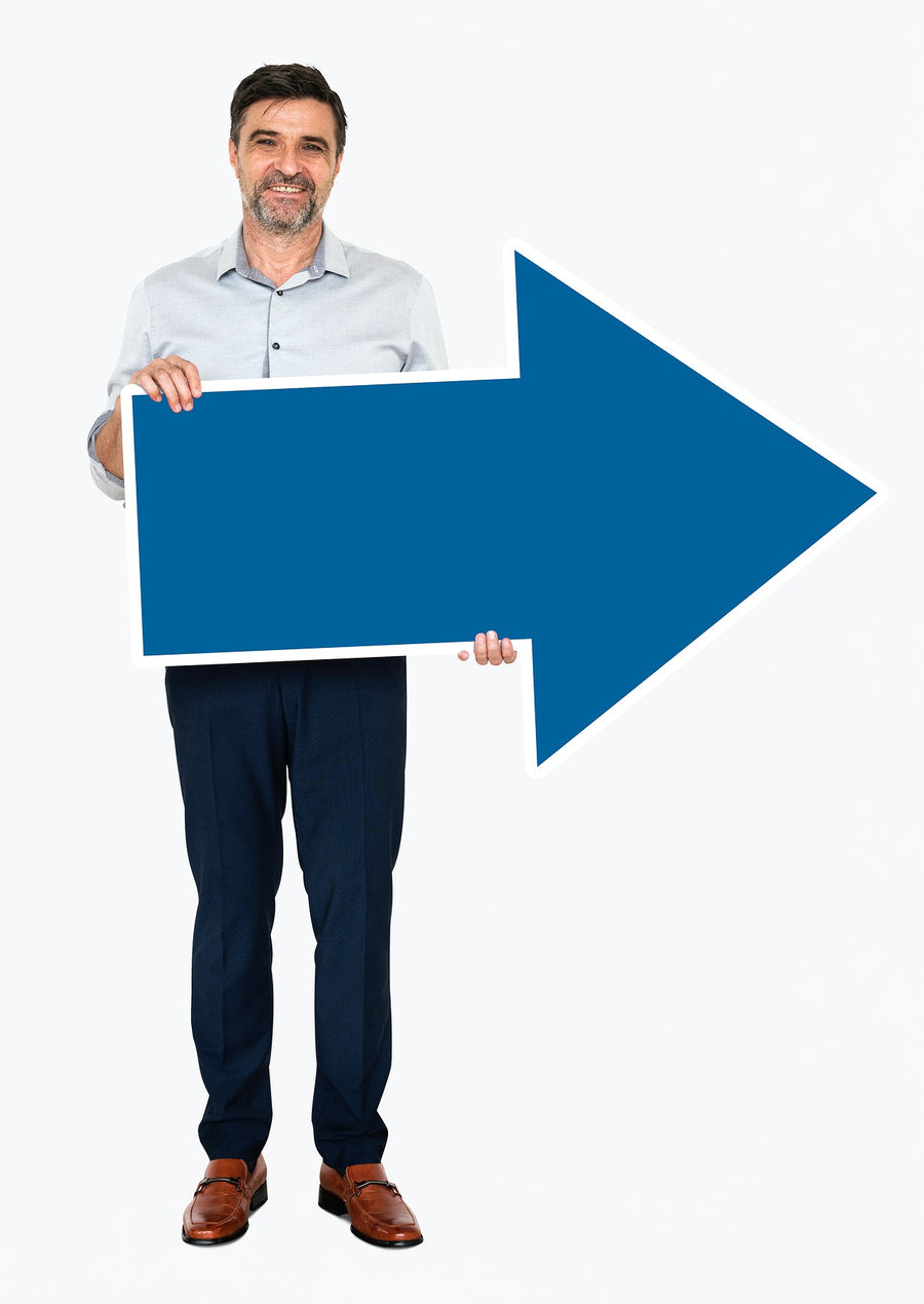 Businessman Holding A Blue Arrow