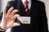 Businessman Holding Business Card Mock-Up Psd