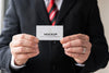 Businessman Holding Business Card Mock-Up With Both Hands Psd