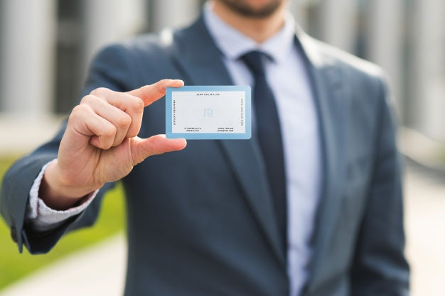 Businessman Holding Business Card Mockup Psd