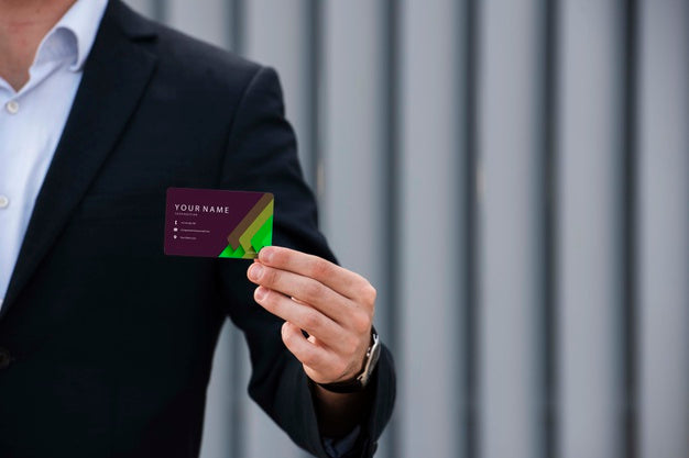 Businessman Holding Company Business Card Psd