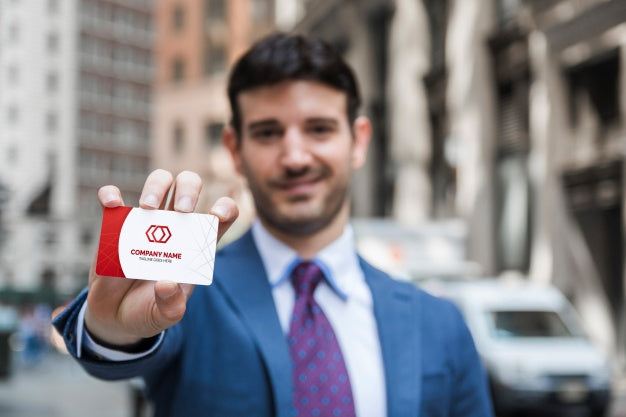 Businessman Presenting Business Card Psd