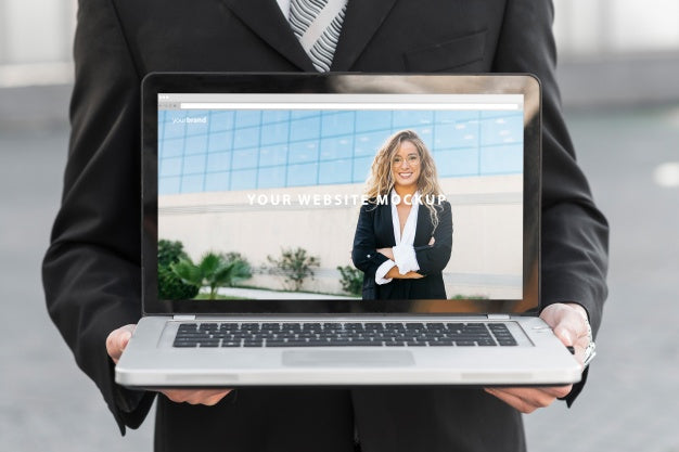 Businessman Presenting Laptop Mockup Psd