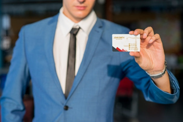 Businessman Showing Business Card Mockup Psd