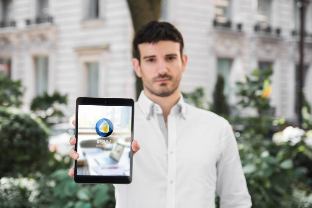 Businessman Using Tablet Mockup Psd
