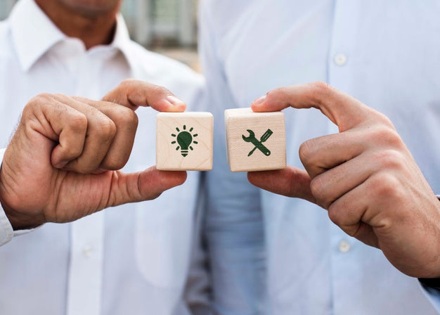 Businessmen Holding Dices With Company Ideas Front View Psd