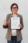 Businesswoman Holding A Mock-Up Clipboard Front View Psd