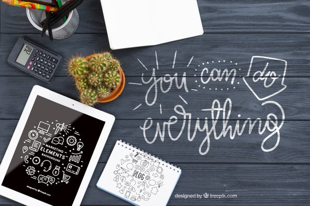 Cactus And Ipad On Desk Psd