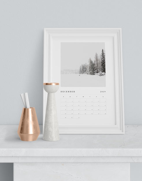 Calendar In Painting Frame On Table Psd