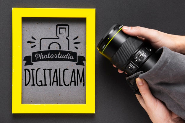 Camera Beside Frame With Studio Logo Psd