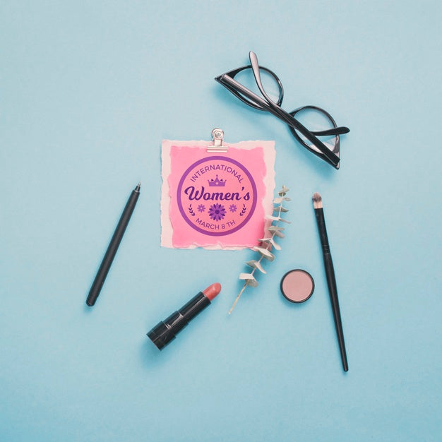 Cardboard Mock-Up With Make-Up And Glasses On Blue Background Psd