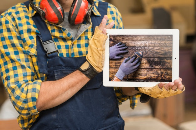 Carpenter Holding Tablet Mockup Psd