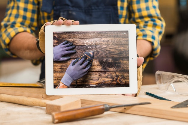 Carpenter Holding Tablet Mockup Psd