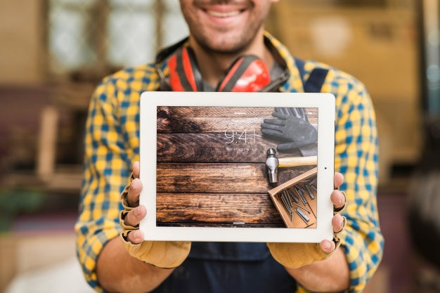 Carpenter Holding Tablet Mockup Psd