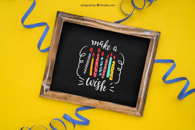 Celebration Decoration With Slate And Streamers Psd