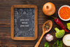 Chalkboard With Organic Vegetables Beside Psd