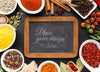 Chalkboard With Wooden Frame Mock-Up Surrounded By Spices And Herbs Psd