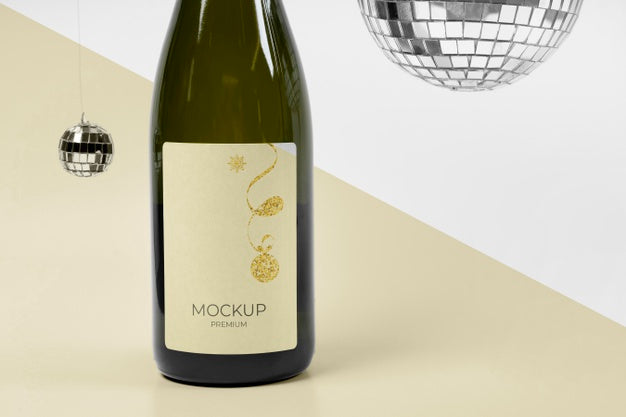 Champagne Bottle Mock-Up And Silver Disco Balls Psd