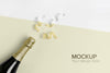 Champagne Bottle Mock-Up And Yellow Confetti Psd