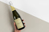Champagne Bottle Mock-Up Held In Hand Psd