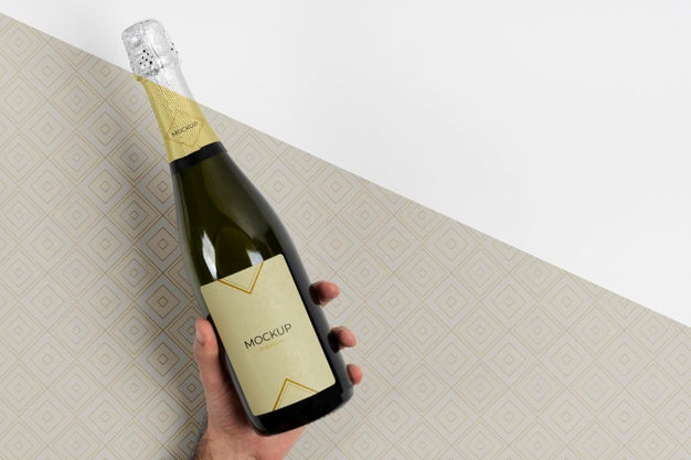 Champagne Bottle Mock-Up Held In Hand Psd