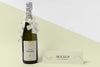 Champagne Bottle Mock-Up With White Ribbons And Bows Psd