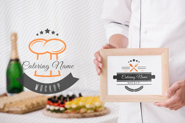 Champagne Next To Frame With Catering Name Placeholder Psd