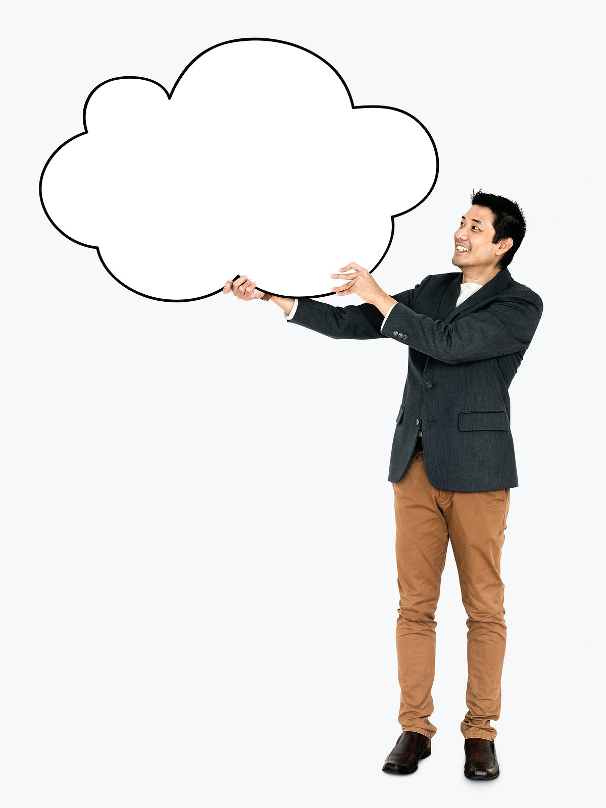 Cheerful Man Showing A Blank Cloud Shaped Board
