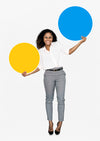 Cheerful Woman Holding Colorful Round Boards Psd