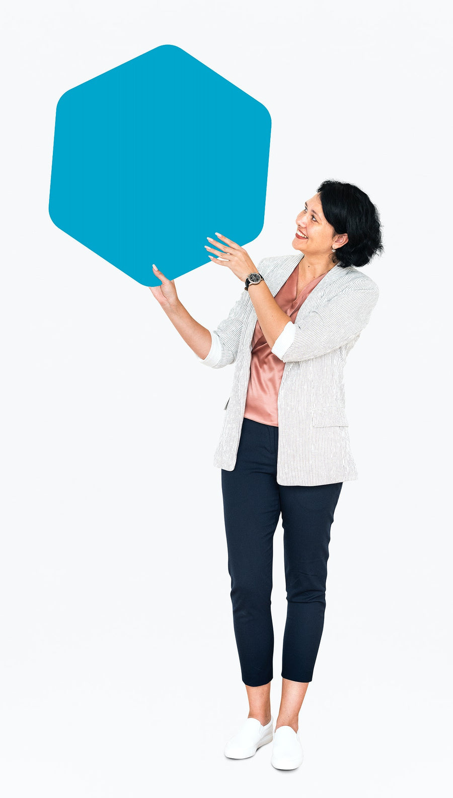 Cheerful Woman Showing A Blank Blue Hexagon Shaped Board