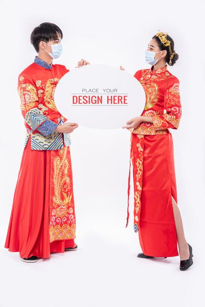 Chinese Man And Chinese Woman Hold Blank Speech Bubble Mockup Psd