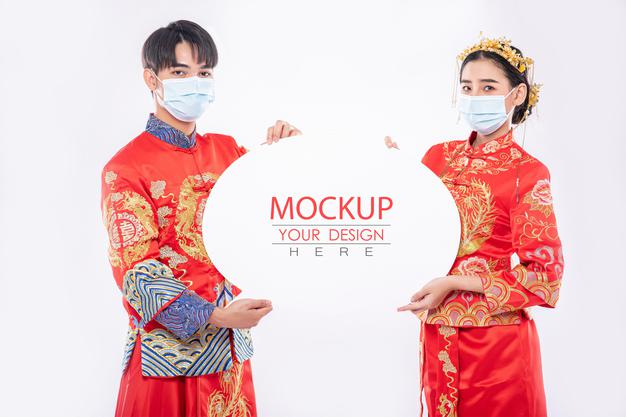 Chinese Man And Chinese Woman Hold Blank Speech Bubble Mockup Psd
