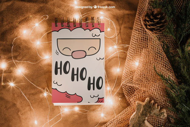 Christmas Mockup With Notepad And Lights Psd