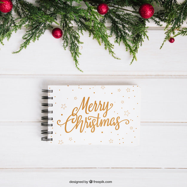 Christmas Mockup With Notepad Below Mistletoe Psd
