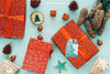 Christmas Mockup With Present Boxes And Pine Cones Psd