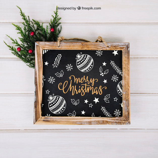 Christmas Mockup With Slate Above Mistletoe Psd