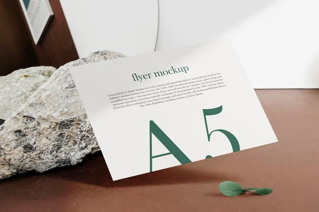 Clean Minimal A5 Flyer Mockup Floating On Top Wood Background With Leaves. Psd File. Psd