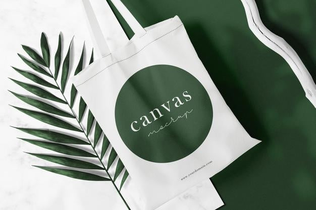 Clean Minimal Bag Canvas Mockup On Top Marble With Leaves And Stick Background. Psd File. Psd